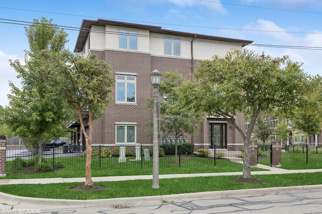 view of property featuring a fenced front yard