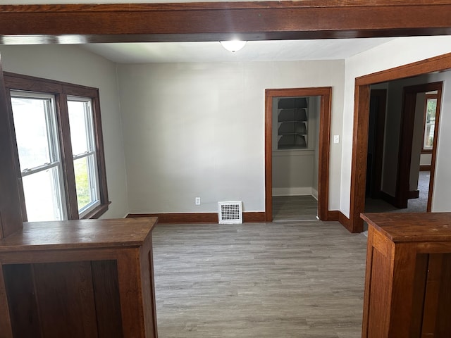 empty room featuring hardwood / wood-style flooring