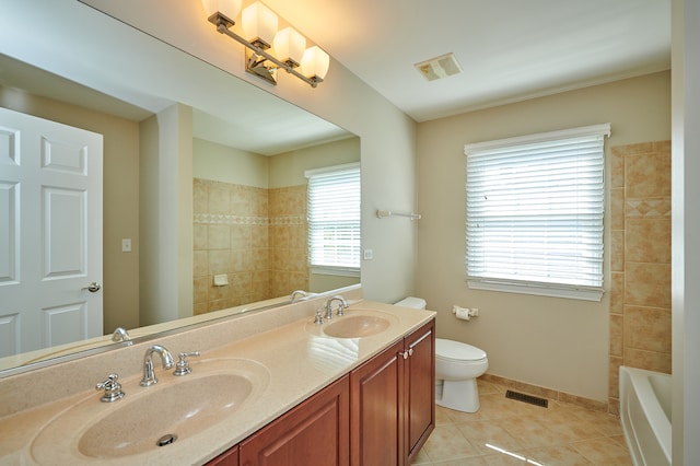 full bathroom featuring vanity, toilet, independent shower and bath, and tile patterned floors