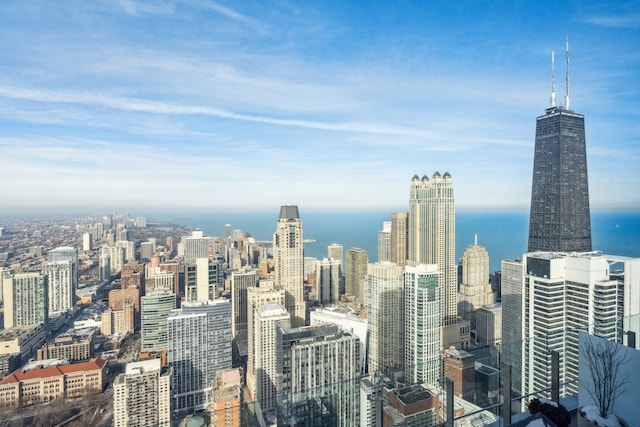 property's view of city with a water view