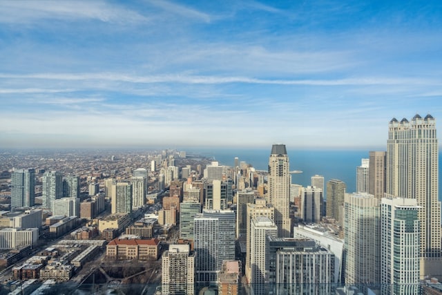 property's view of city featuring a water view