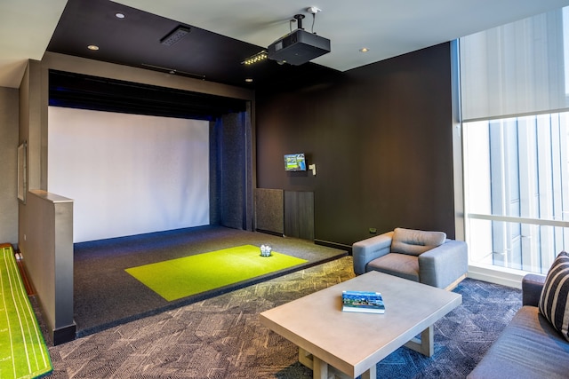 game room with dark colored carpet and golf simulator