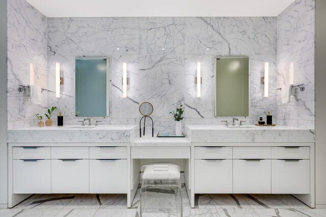 bathroom with tile walls, tile patterned flooring, and vanity