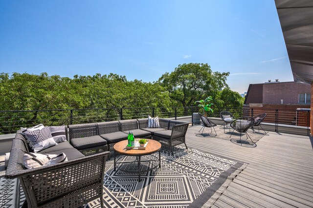 wooden deck with outdoor lounge area