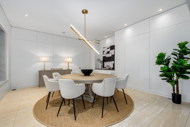 dining room with light tile patterned floors