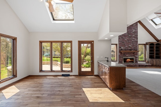 3944 Paradise Canyon Ct, Naperville, IL 60564 - bar with a skylight, high vaulted ceiling, and hardwood / wood-style floors