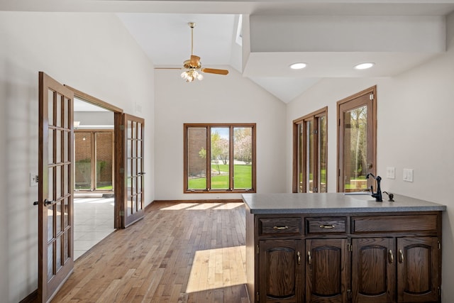3944 Paradise Canyon Ct, Naperville, IL 60564 - interior space featuring ceiling fan, french doors, a sink, light wood finished floors, and a peninsula