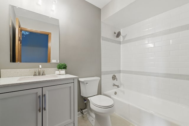 full bathroom featuring shower / bath combination, tile patterned floors, toilet, and vanity