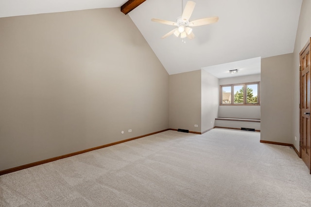 additional living space featuring baseboards, light carpet, and vaulted ceiling with beams