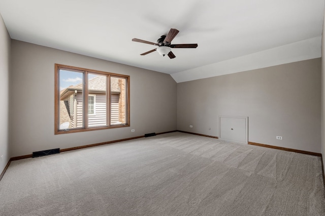 bonus room with baseboards, carpet flooring, and visible vents