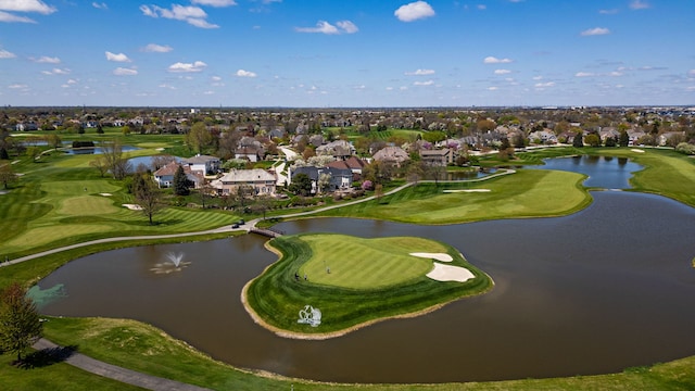 aerial view featuring a water view, golf course view, and a residential view