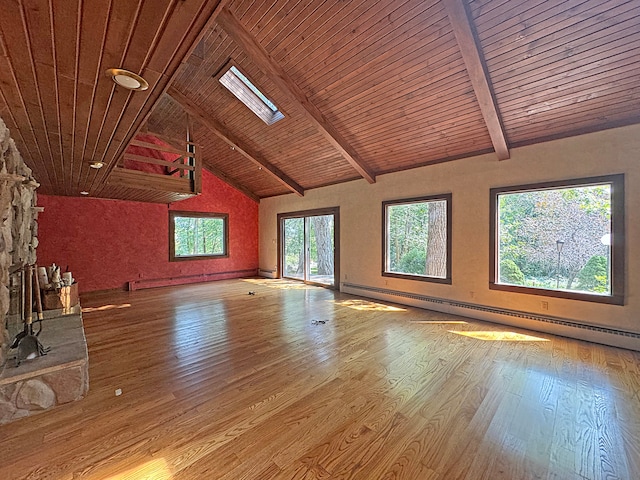 unfurnished living room with wood ceiling, vaulted ceiling with skylight, light hardwood / wood-style flooring, and a baseboard radiator