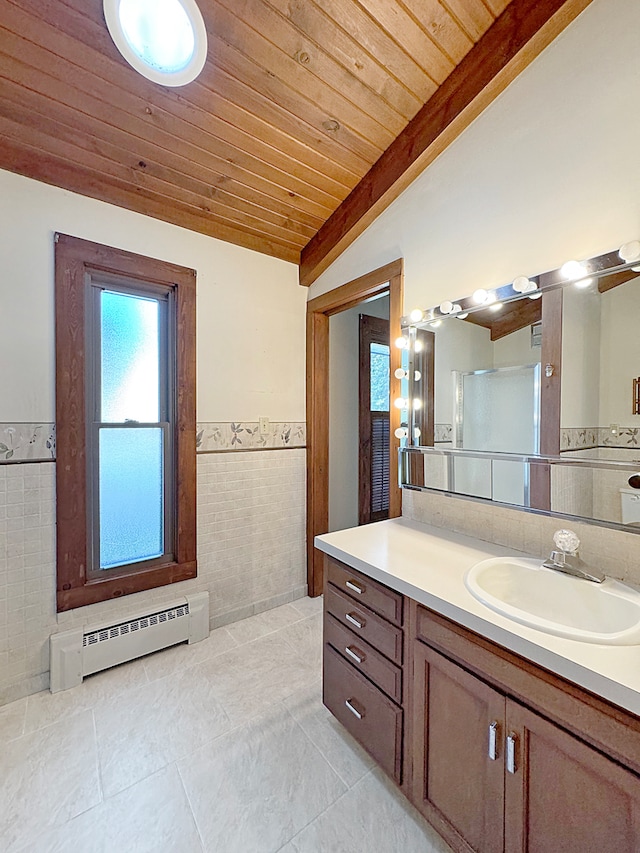 bathroom featuring lofted ceiling, vanity, wood ceiling, tile walls, and baseboard heating