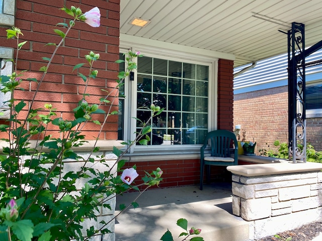 entrance to property with covered porch