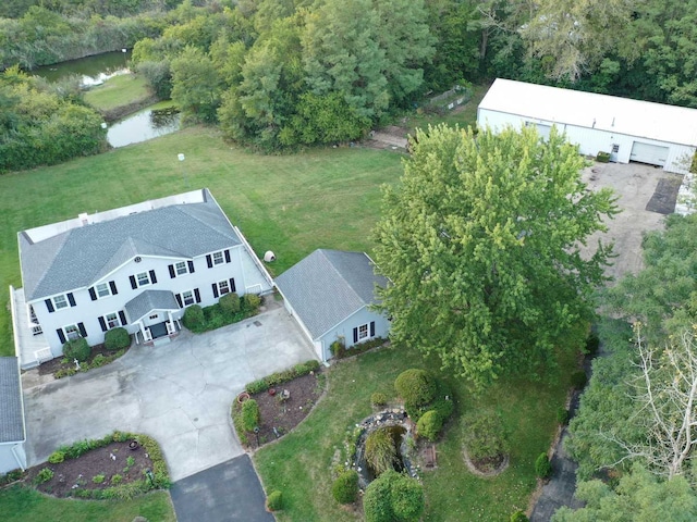 bird's eye view with a water view