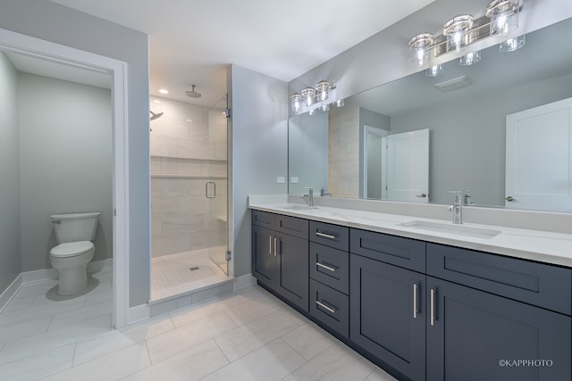 bathroom with dual bowl vanity, toilet, walk in shower, and tile patterned floors