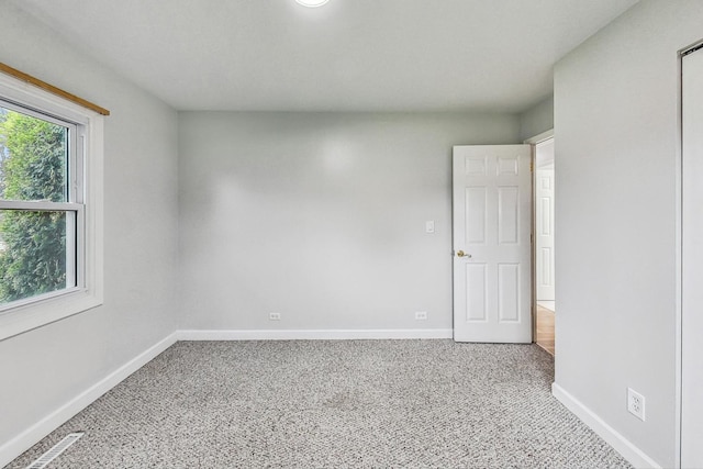 view of carpeted spare room