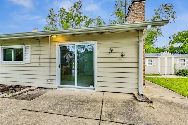 doorway to property featuring a patio area