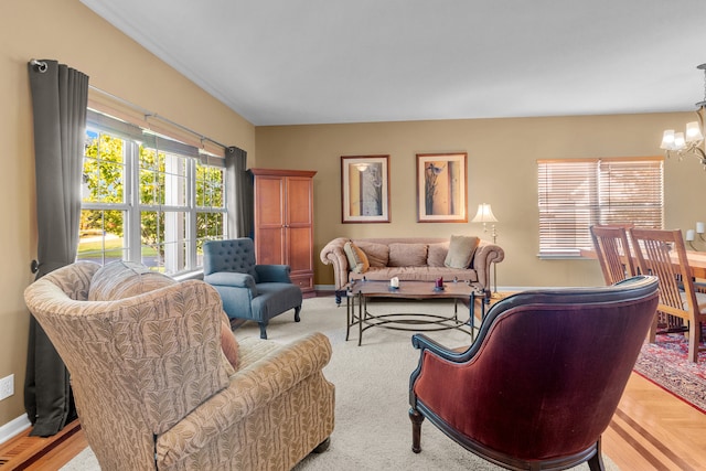 living room featuring a chandelier