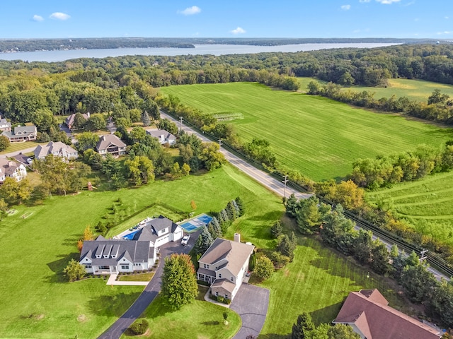 drone / aerial view with a water view and a rural view