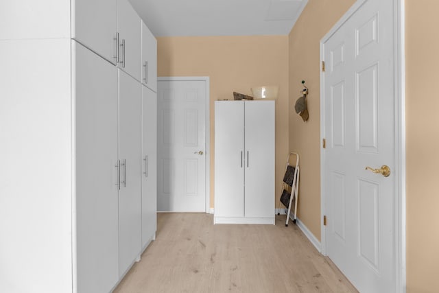 hallway featuring light hardwood / wood-style floors