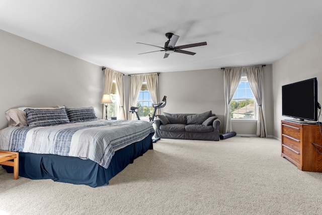 bedroom featuring ceiling fan and carpet flooring