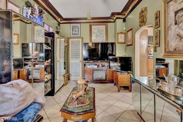 2656 W Logan Blvd, Chicago, IL 60647 - living area with ornamental molding, arched walkways, and light tile patterned floors