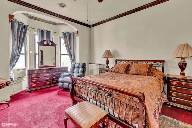 carpeted bedroom featuring cooling unit, ceiling fan, and ornamental molding