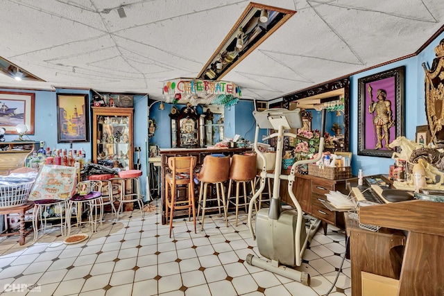 2656 W Logan Blvd, Chicago, IL 60647 - indoor dry bar featuring tile patterned floors and a drop ceiling