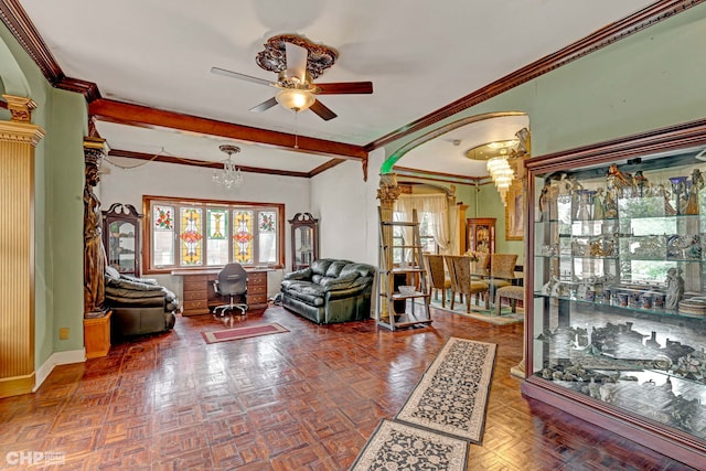 2656 W Logan Blvd, Chicago, IL 60647 - living area with arched walkways, ceiling fan, plenty of natural light, ornamental molding, and ornate columns
