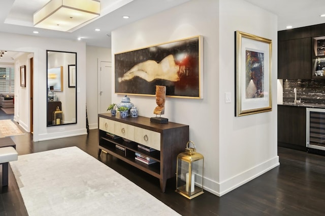 1040 N Lake Shore Dr Unit 9A, Chicago, IL 60611 - hall featuring wine cooler, baseboards, dark wood-type flooring, recessed lighting, and a sink