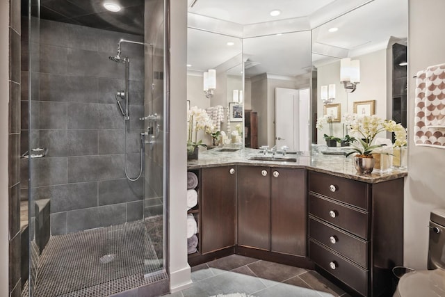 1040 N Lake Shore Dr Unit 9A, Chicago, IL 60611 - bathroom featuring tiled shower, tile patterned floors, vanity, and recessed lighting
