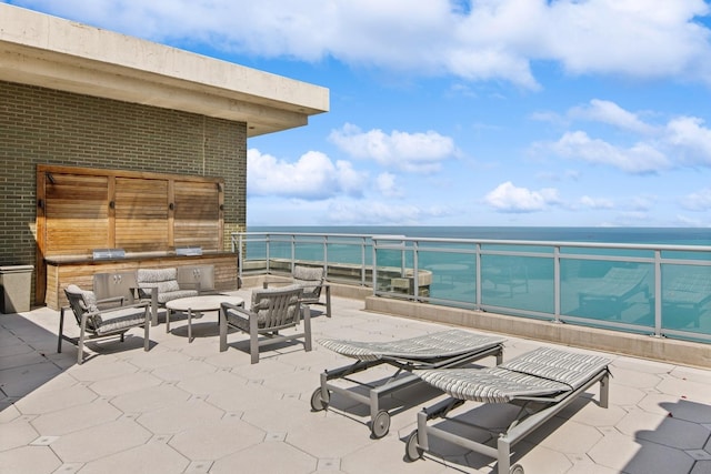 1040 N Lake Shore Dr Unit 9A, Chicago, IL 60611 - view of patio / terrace with a water view, exterior kitchen, and outdoor lounge area