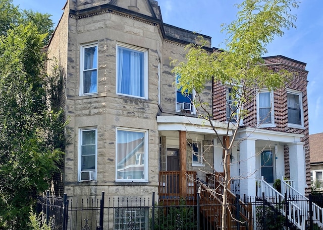 view of front of home featuring cooling unit