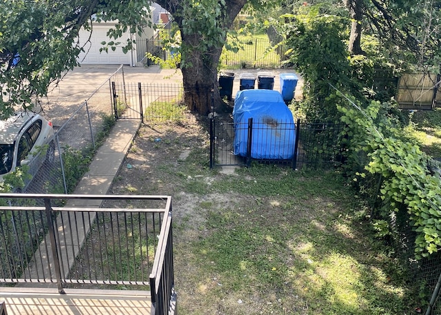 view of yard featuring a garage