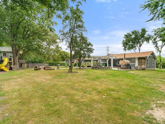 view of yard with a playground