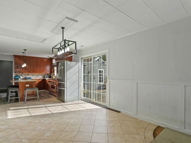 tiled dining space with ornamental molding