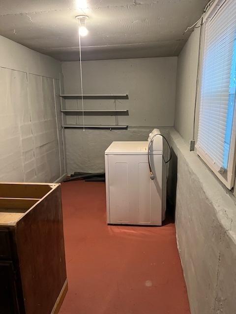 interior space featuring laundry area and washer / dryer