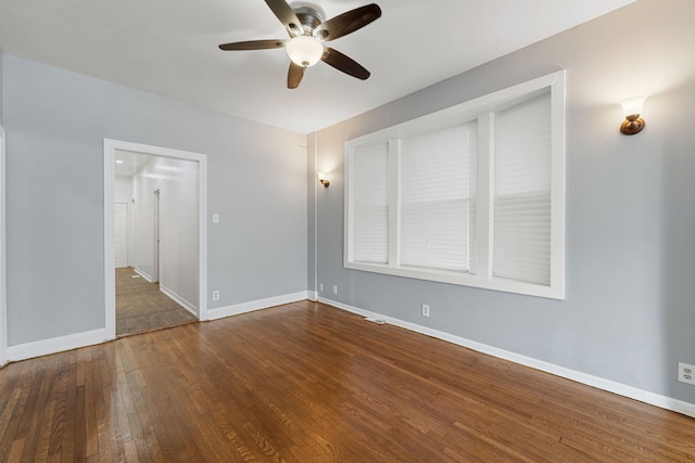 unfurnished room featuring hardwood / wood-style flooring and ceiling fan