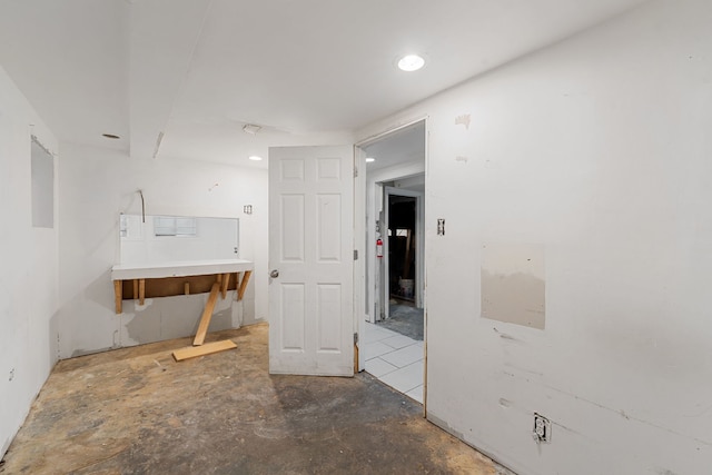 interior space featuring concrete flooring