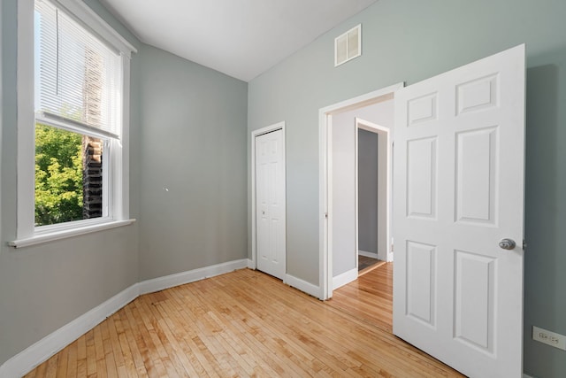 unfurnished bedroom with light hardwood / wood-style flooring