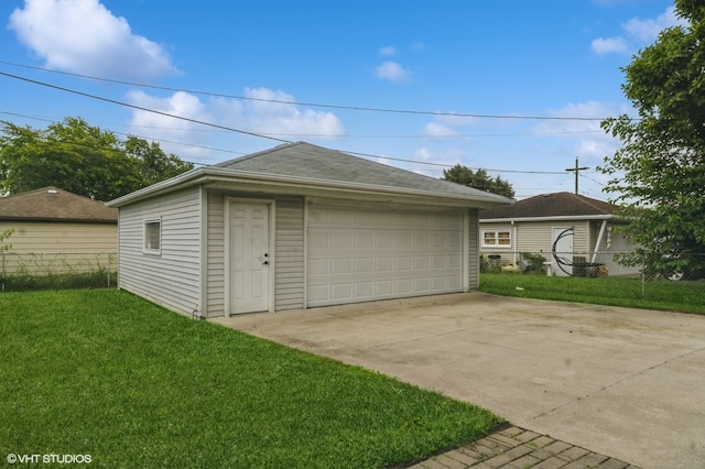 garage with a lawn