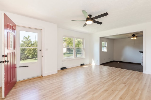 interior space featuring ceiling fan and light hardwood / wood-style floors