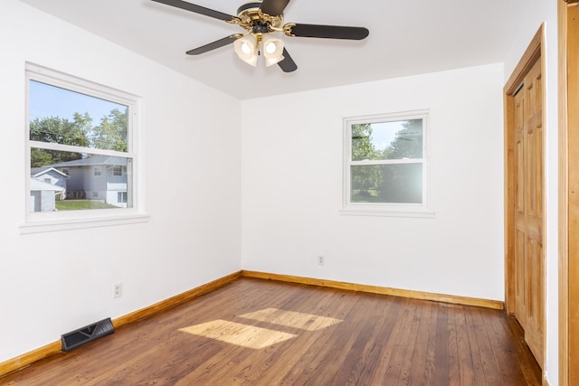 unfurnished bedroom with hardwood / wood-style floors and ceiling fan