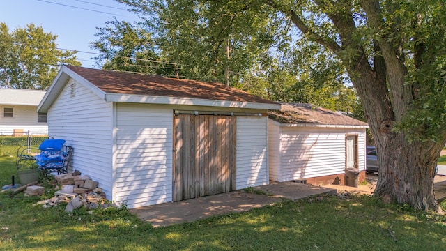 garage with a lawn