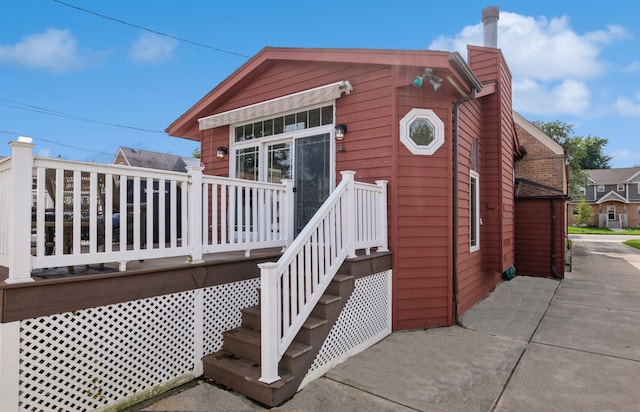 exterior space featuring a wooden deck