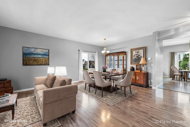 dining room featuring light hardwood / wood-style floors and an inviting chandelier