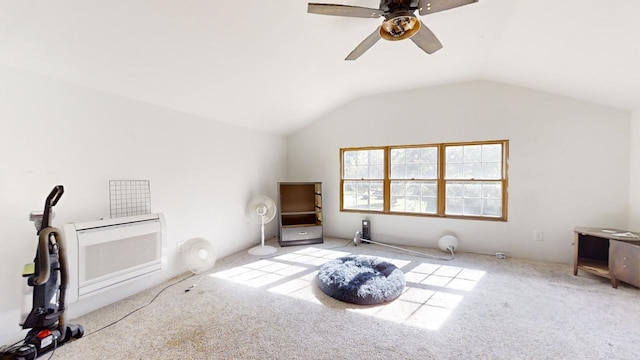 additional living space with light carpet, vaulted ceiling, and ceiling fan