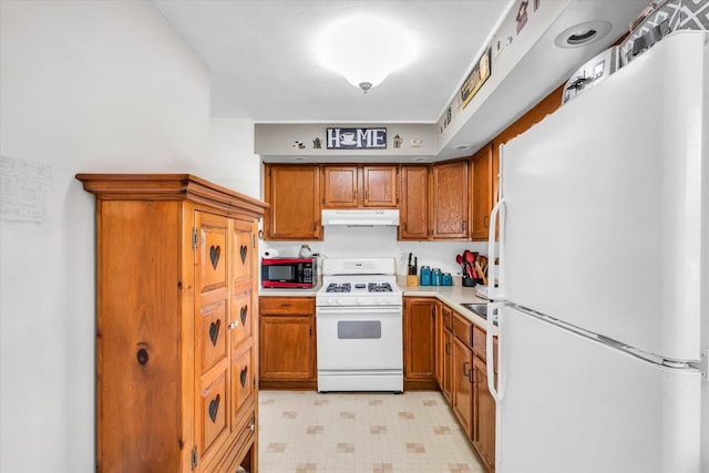 kitchen featuring white appliances