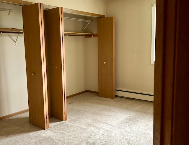 closet featuring a baseboard radiator